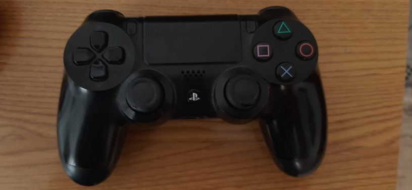 manette-ps4-a-vendre-etat-comme-neuf-910-mafeha-hata-probleme-big-0